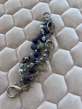 Multi-Strand Purple Beaded Bracelet with Silver Rings